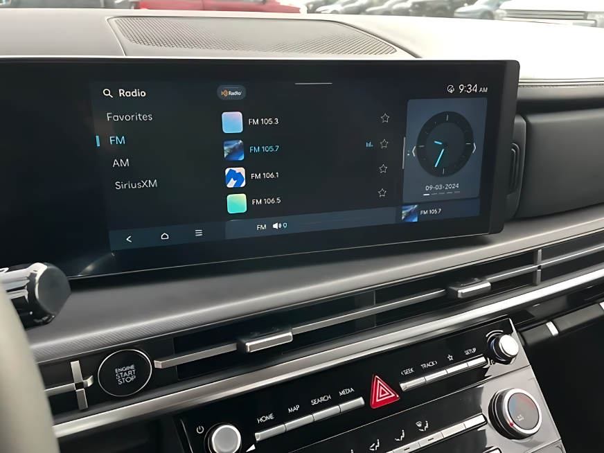 Close-up of Hyundai infotainment system showing FM radio interface inside a new model at Crain Hyundai of Fayetteville.